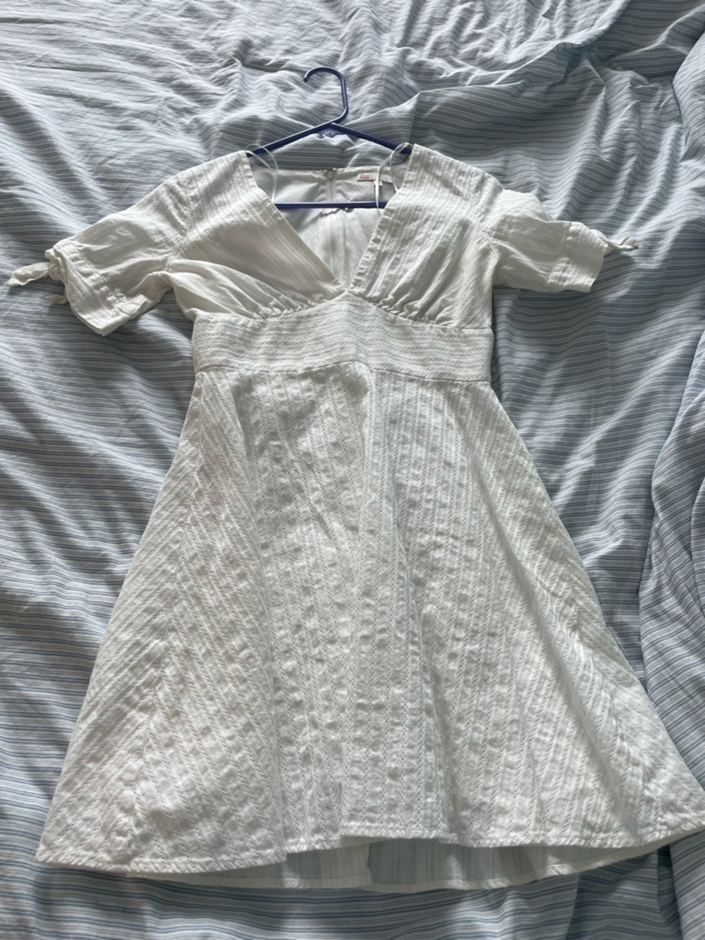White Textured Mini Dress with V-Neck and Tie Sleeves